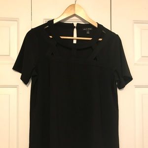 Black, short sleeve blouse.